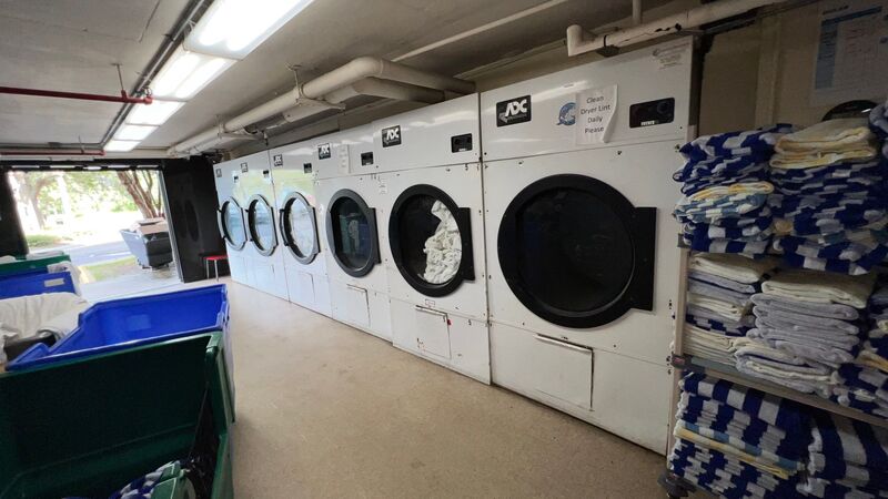 Large commercial laundromat for dryer vent cleaning