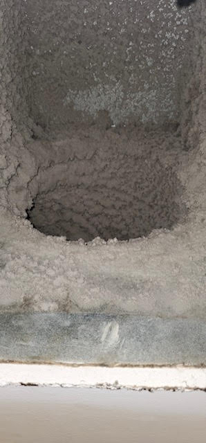 Commercial exhaust vent with excessive dirt, dust and debris
